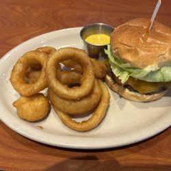 The Sports Bar Westside - "The Druce" 1/3 lb burger ($13.95)with an order of onion rings($4.75). 1/2 lb patties optional for a slightly higher price.