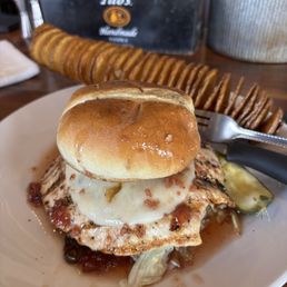 Chicken sandwich with homemade chips. Chicken sandwich with homemade chips.