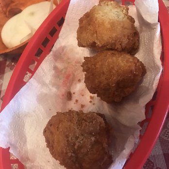 Uncle Bud's - Hush puppies. This was our second round, and I still couldn't snap a pic before they started disappearing! - Seafood Near Me - Nashville, Tennessee Uncle Bud's - Hush puppies. This was our second round, and I still couldn't snap a pic before they started disappearing! - Seafood Near Me - Nashville, Tennessee