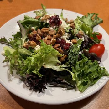 Kokopelli Grill - House salad - mixed greens topped with queso fresco, chopped pecans, dried cranberries, and tomatoes - Seafood Near Me - Port Angeles, Washington Kokopelli Grill - House salad - mixed greens topped with queso fresco, chopped pecans, dried cranberries, and tomatoes - Seafood Near Me - Port Angeles, Washington