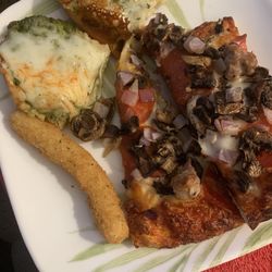 Stone Fire Pizza - Pizza with sausage, onion, olives, and mushrooms, sides of the best garlic bread with pesto sauce, and mozzarella sticks
