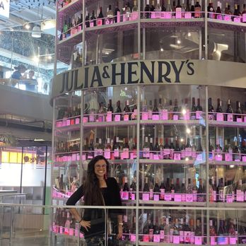Julia & Henry's - Julia & Henry wine display with elevator - Food Court Near Me - Miami, Florida