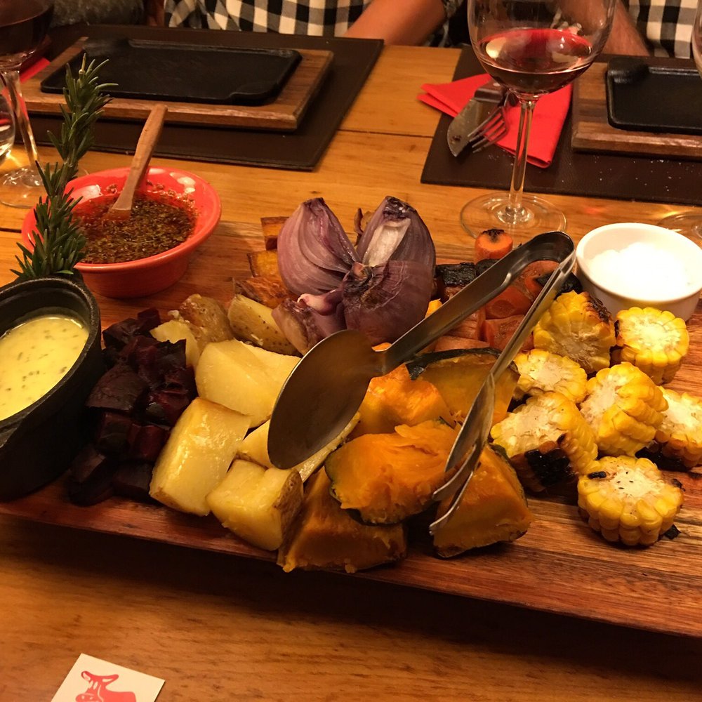 The Argentine Experience - Garlic butter & chimichurri sauces, onions, carrots, potatoes, pumpkin, corn on the cob - VN - Argentine Near Me - Buenos Aires, C The Argentine Experience - Garlic butter & chimichurri sauces, onions, carrots, potatoes, pumpkin, corn on the cob - VN - Argentine Near Me - Buenos Aires, C