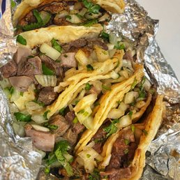 Tacos: al pastor, lengua, & cabeza Tacos: al pastor, lengua, & cabeza