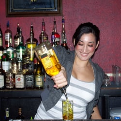 Riverside Bartending School - A Riverside Bartending School student having fun and learning new drinks.