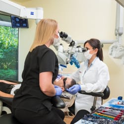 Pla & Watts Endodontics - Dr. Loubna Pla and her assistant use a Zeiss PROergo Dental Microscope for the ultimate in precision care.