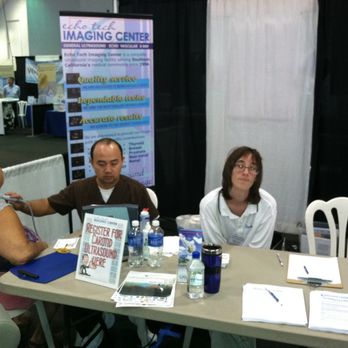 Echo Tech Imaging - Sy and Lotus at the 2013 Golden Future's Expo - ETI booth providing free Carotid screenings - Diagnostic Services Near Me - Simi Valley, California Echo Tech Imaging - Sy and Lotus at the 2013 Golden Future's Expo - ETI booth providing free Carotid screenings - Diagnostic Services Near Me - Simi Valley, California