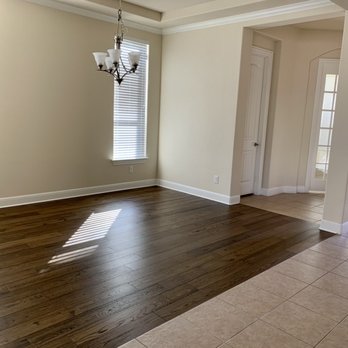 Hardwood Flooring Services - a room with a chandelier - Flooring Near Me - Austin, Texas Hardwood Flooring Services - a room with a chandelier - Flooring Near Me - Austin, Texas