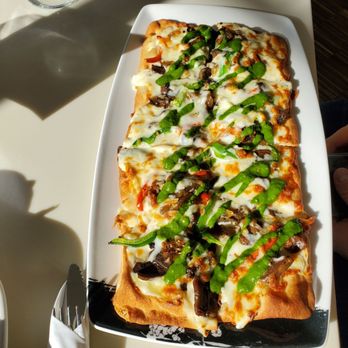 Maclab Bistro - Mushroom and truffle Flatbread pizza - Bistros Near Me - Banff, Alberta Maclab Bistro - Mushroom and truffle Flatbread pizza - Bistros Near Me - Banff, Alberta