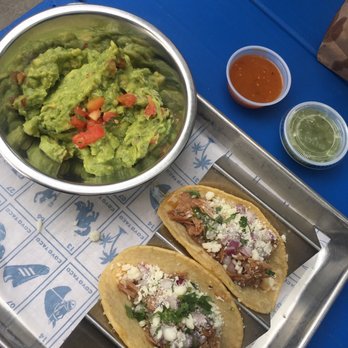 Coyo Taco - Carnitas Tacos and Chips + Large Guacamole - Mexican Near Me - Miami, Florida Coyo Taco - Carnitas Tacos and Chips + Large Guacamole - Mexican Near Me - Miami, Florida