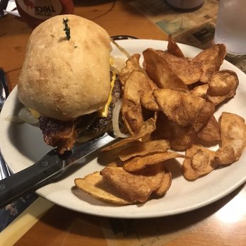 Country Cousin - Uncle Dicks burger. 2 Pattie's, pulled pork, bacon and carmelized onions on a ciabatta roll and homemade potato chips - American Near Me - Centralia, Washington