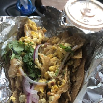 Naco Mexican Eatery - Green Chilaquiles with egg, on a corn tortilla - Food Trucks Near Me - San Antonio, Texas Naco Mexican Eatery - Green Chilaquiles with egg, on a corn tortilla - Food Trucks Near Me - San Antonio, Texas
