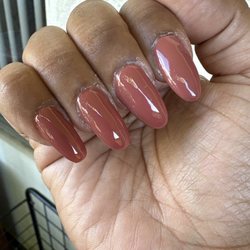 Sloppy shape and terrible application, shaping at the cuticle. I'm pissed!