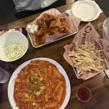 Pelicana Chicken - half crispy fried boneless with signature sauce, peli shaken fries, rose tteokbokki - Chicken Wings Near Me - Buena Park, California Pelicana Chicken - half crispy fried boneless with signature sauce, peli shaken fries, rose tteokbokki - Chicken Wings Near Me - Buena Park, California