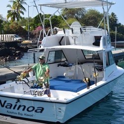 Nainoa Sport Fishing - Captain Bill with the Nainoa at the pier