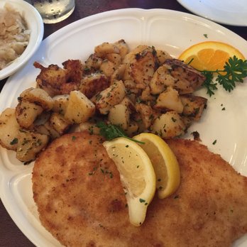 Alpine Haus Restaurant - Schnitzel, tasty with fried potatoes. - German Near Me - New Braunfels, Texas