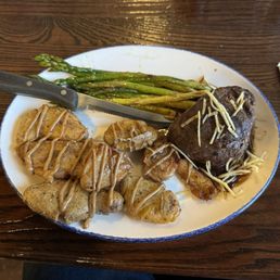 Filet mignon asparagus and cracked fingerling. Filet mignon asparagus and cracked fingerling.