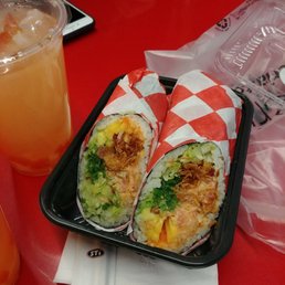 Salmon burrito with mango. Peach lychee drinks - one frozen and another luke warm. Salmon burrito with mango. Peach lychee drinks - one frozen and another luke warm.