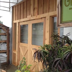 Tradition Market And Garden - New barn door entrance under construction.
