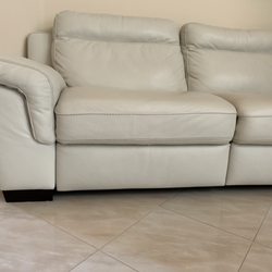 Macy's Furniture Gallery - Notice left lower section isn't level with arm
