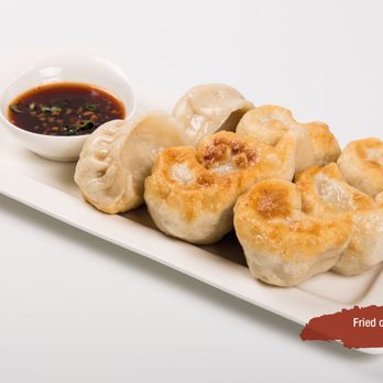 China Wok - a plate of dumplings with dipping sauce - Chinese Near Me - Lagrangeville, New York China Wok - a plate of dumplings with dipping sauce - Chinese Near Me - Lagrangeville, New York