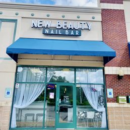 Exterior outside entrance of New Beauty Nail Bar - We are a faith-based Christian nail salon and the only Black owned, upscale, modern nail salon in the Memphis suburbs. - Bartlett, Tennessee Exterior outside entrance of New Beauty Nail Bar - We are a faith-based Christian nail salon and the only Black owned, upscale, modern nail salon in the Memphis suburbs. - Bartlett, Tennessee