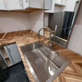 AMS Renovations - Herringbone butcher block counter top and slate floor, another suggestion from stu - Painters Near Me - Jamesport, New York