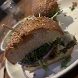 LOCAL Public Eatery Medicine Hat - This is the veggie burger and it's rice and mushroom and gluten-free bun and the salad that came with it came with the vinaigrette house