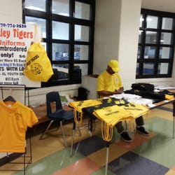 Keepin-U-N-Stitchez - School uniforms being sold.