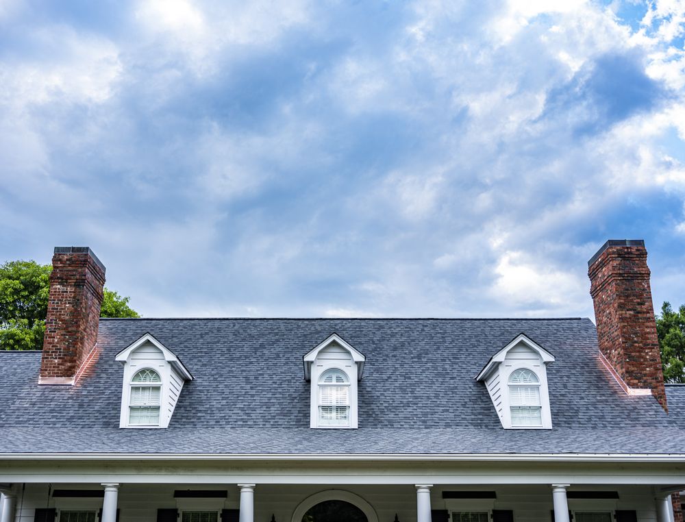 Slide of Guy Roofing