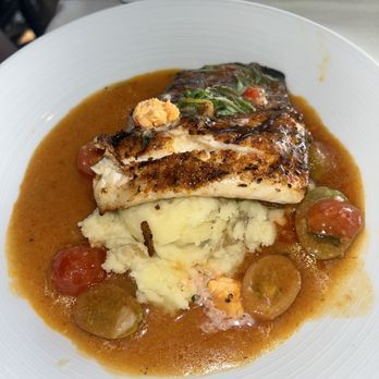 Rusty Pelican - Fish was cooked to perfection, it does have a kick to it as well!! - Seafood Near Me - Newport Beach, California