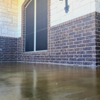 DC Decorative - a brick wall with a cross on it - Flooring Near Me