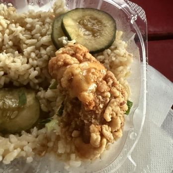 Pine Tree Cafe - One of three pieces of chicken in the spicy garlic chicken. Not a lot of sauce and chicken was unevenly cooked. Lots of rice. - Breakfast & Brunch Near Me - Kailua-Kona, Hawaii