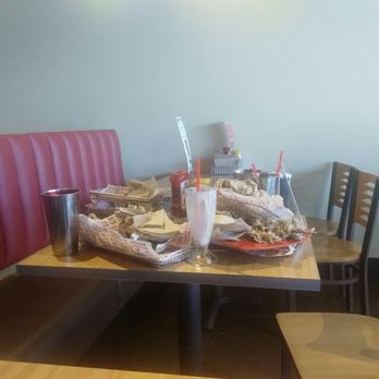 Smashburger - The table next to us where we had to pile up the previous customers food after we had to bus our own table. Groooooossssss!!!! - Burgers Near Me - Louisville, Colorado Smashburger - The table next to us where we had to pile up the previous customers food after we had to bus our own table. Groooooossssss!!!! - Burgers Near Me - Louisville, Colorado