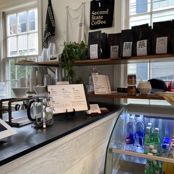 Second State Coffee - a counter with drinks and menus - Coffee & Tea Near Me - Charleston, South Carolina
