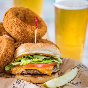 Huey's Downtown - The original World Famous Huey Burger with a side of hand-breaded onion rings and a cold pint of beer - Burgers Near Me - Memphis, Tennessee