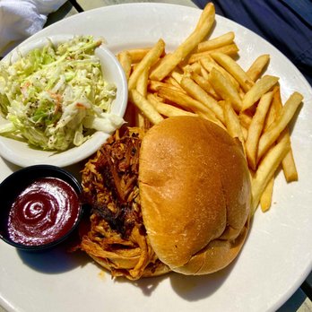 The Conch House Restaurant - Pulled Pork Sandwich with fries and coleslaw - Caribbean Near Me - Saint Augustine, Florida