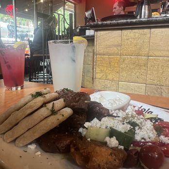 Lola - Kebab with Tzatziki- Cucumber Yogurt, Jackie's Greek Salad, Fresh Pita and Smashed Garlic Fried Potatoes - Greek Near Me - Seattle, Washington Lola - Kebab with Tzatziki- Cucumber Yogurt, Jackie's Greek Salad, Fresh Pita and Smashed Garlic Fried Potatoes - Greek Near Me - Seattle, Washington