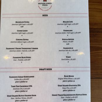 Section Street Pizza - a menu on a wooden table - Pizza Near Me - Fairhope, Alabama Section Street Pizza - a menu on a wooden table - Pizza Near Me - Fairhope, Alabama