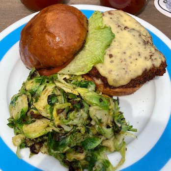 The Cabbage Shed - Buttermilk chicken sandwich with Brussels sprouts - New American Near Me - Elberta, Michigan The Cabbage Shed - Buttermilk chicken sandwich with Brussels sprouts - New American Near Me - Elberta, Michigan