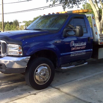 Expresstech Auto Repair - Expresstech Auto Repair flatbed tow truck - Auto Repair Near Me - Palm Bay, Florida Expresstech Auto Repair - Expresstech Auto Repair flatbed tow truck - Auto Repair Near Me - Palm Bay, Florida