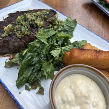 Sylvan Table - Fire grilled steak with polenta fries and celery root mash - New American Near Me - Sylvan Lake, Michigan