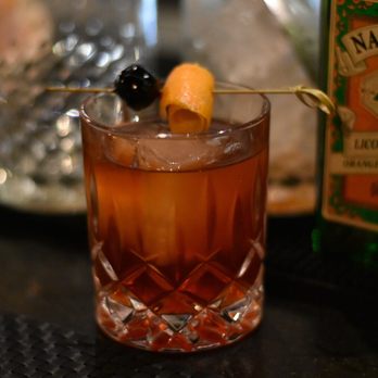 Chaak Kitchen - Old Fashioned Inspired - bourbon, mezcal, vanilla simple syrup, chocolate mole & angostura bitters, orange & lemon oils - Cocktail Bars Near Me - Tustin, California Chaak Kitchen - Old Fashioned Inspired - bourbon, mezcal, vanilla simple syrup, chocolate mole & angostura bitters, orange & lemon oils - Cocktail Bars Near Me - Tustin, California