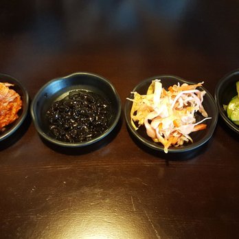 Arario - Side dishes. Kimchi, black beans, coleslaw, and zucchini. - Korean Near Me - Reno, Nevada
