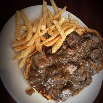Maude's Taphouse - Open Faced Guiness Beef: Beef braised in Guinness beer & brown sugar served on an onion bun open face style. Worth a try!! - New American Near Me - Otsego, Michigan