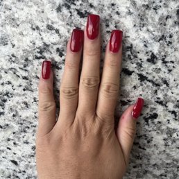 Burgundy colored shovel nails.