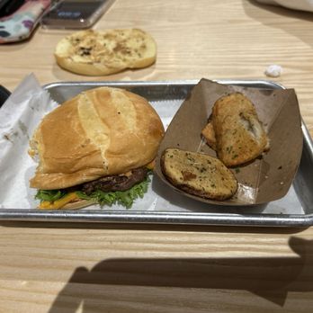 Seven Brothers - The Seth burger with no tomato, or grilled onion and a side of house fries. - Burgers Near Me - Farmington, Utah Seven Brothers - The Seth burger with no tomato, or grilled onion and a side of house fries. - Burgers Near Me - Farmington, Utah
