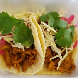 Pork tacos( aka cochinita pibil) with pickled onions and cilantro