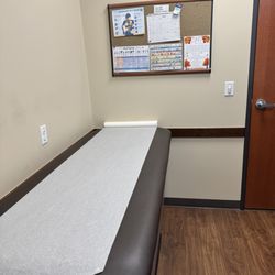Colorado Allergy & Asthma Centers - Littleton - Examination room stretcher