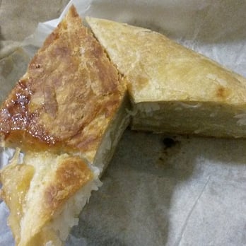 Errol's Caribbean Bakery - Coconut Roll Cut in half (Top/Caramelized Bottom) - Bakeries Near Me - Brooklyn, New York